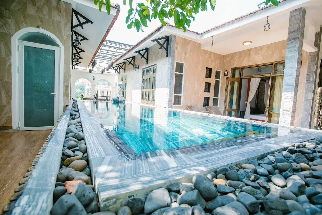 Pool and greenery at Dazi Retreat Hue
